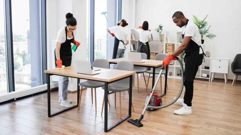 Team of office cleaners